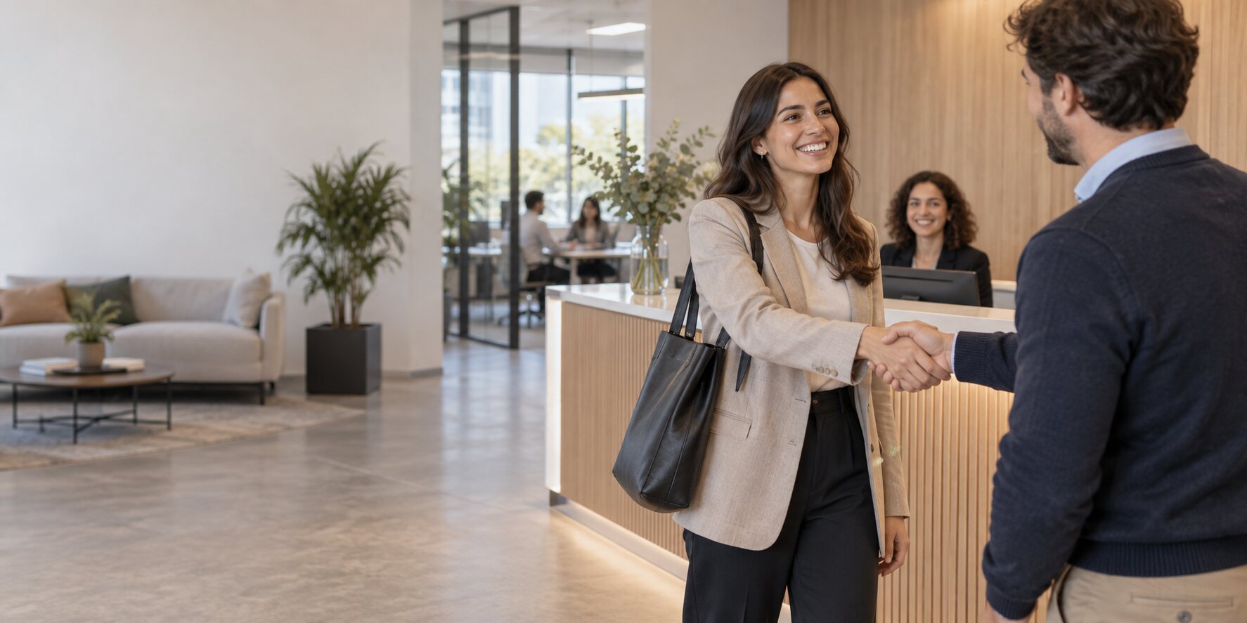 New employee greeting colleagues on the first day at work